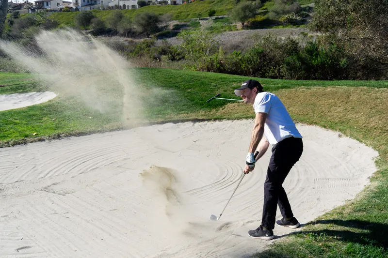 Golf sand swing